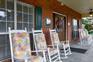 Country Cottage Montgomery front porch with rocking chairs