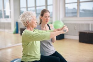elderly lady in fitness class